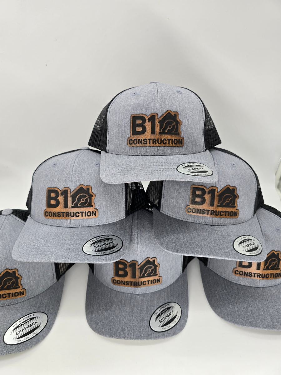 Custom logo leather-patch hats for a business