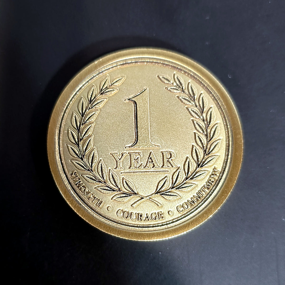 1 Year sobriety brass coin, embossed