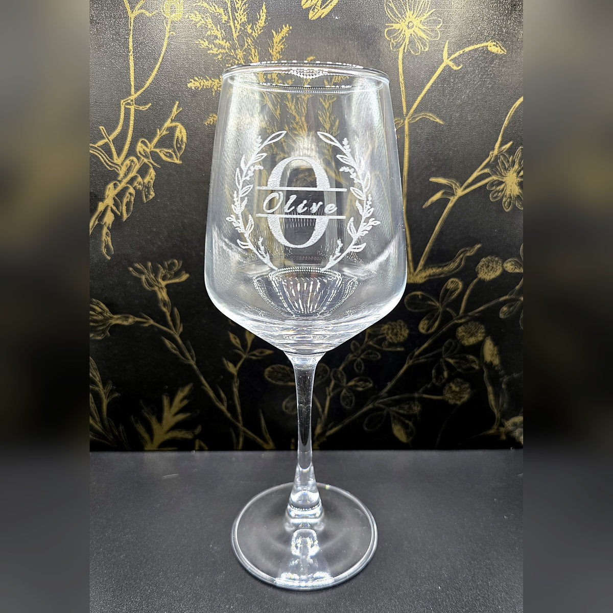 Engraved stemmed wine glass