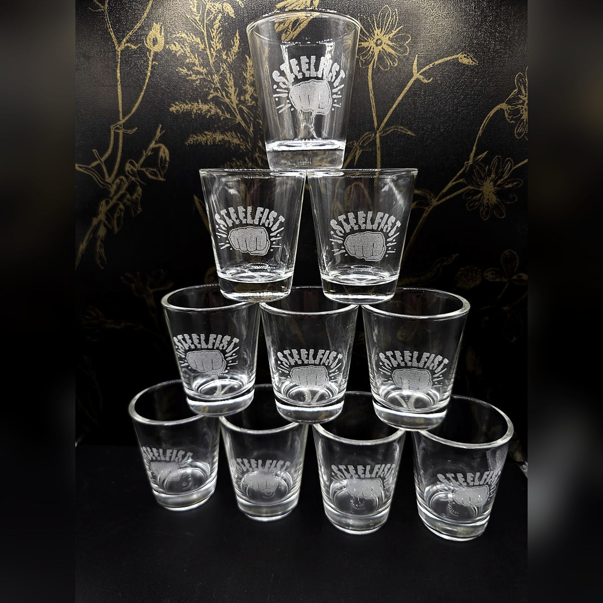 Stack of engraved shot glasses